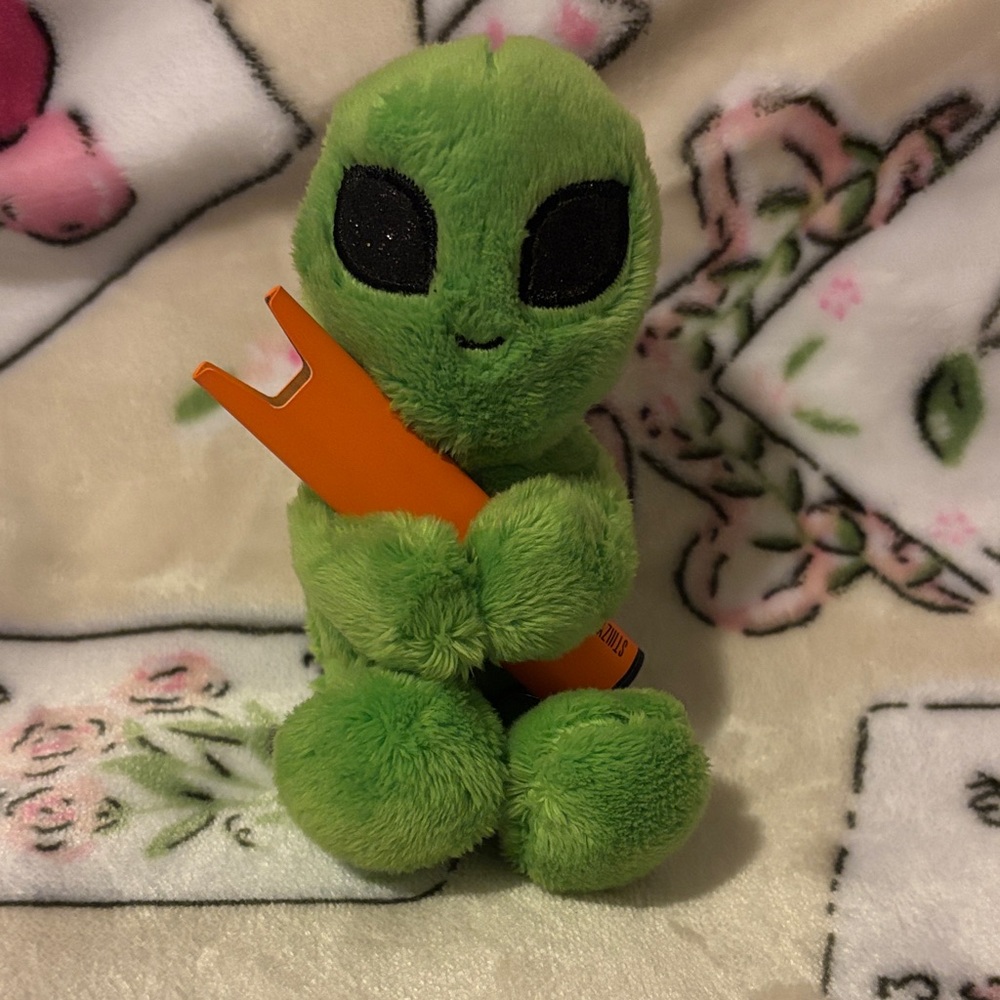 Alien “pen” holder